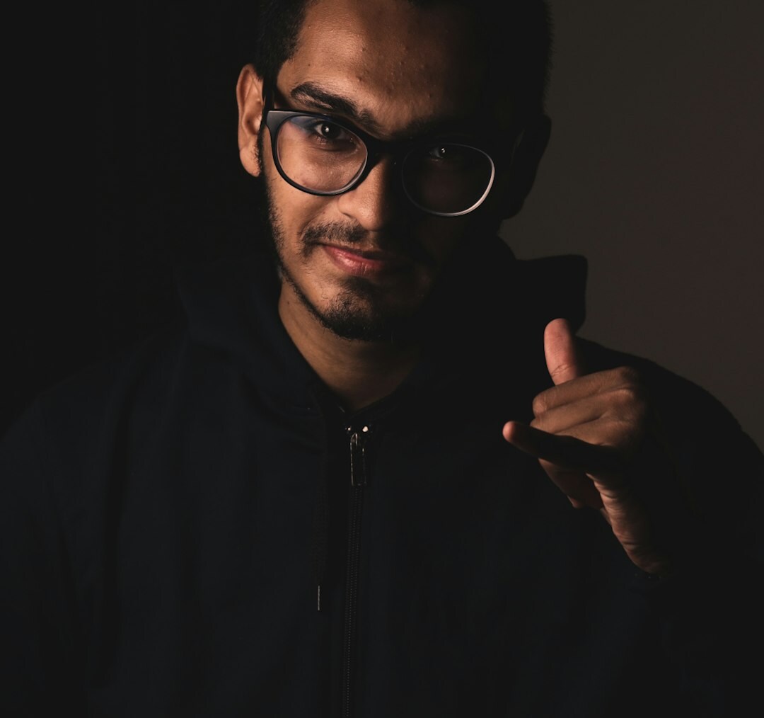 Portrait of a Belgian male trainer with glasses