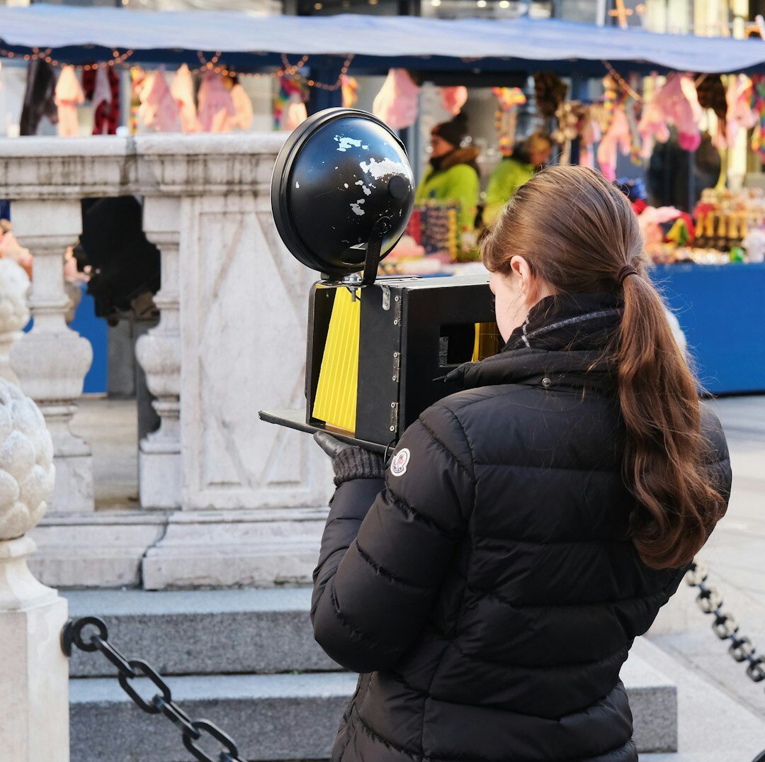 Female reporter filming a report outdoors in the city